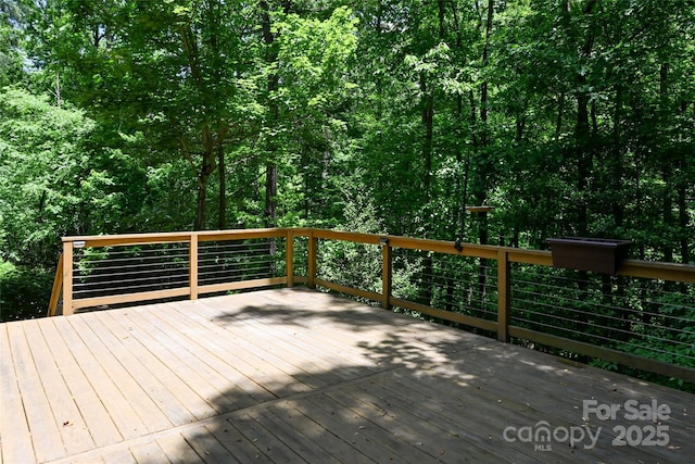1 E Owl Creek Ln, Fairview, NC 28730 - wooden deck featuring a wooded view