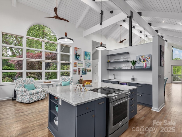 6 Lakeway Cir, Weaverville, NC 28787 - kitchen featuring open shelves, stainless steel electric range oven, ceiling fan, a center island, and decorative light fixtures