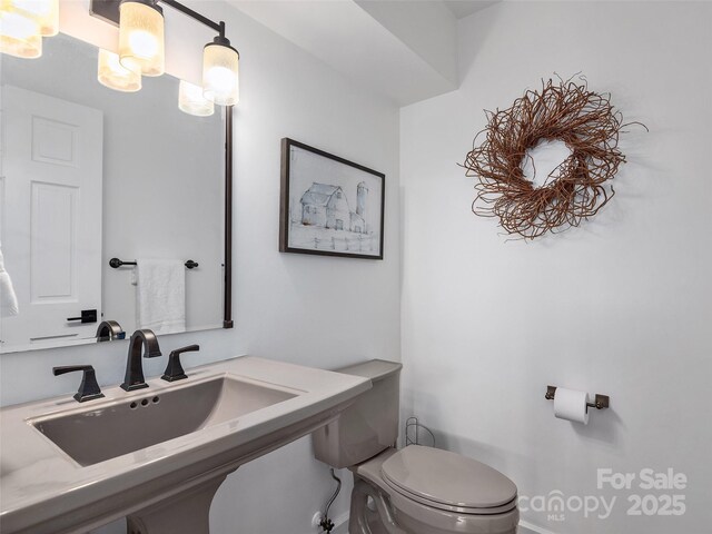 6 Lakeway Cir, Weaverville, NC 28787 - bathroom featuring a sink and toilet