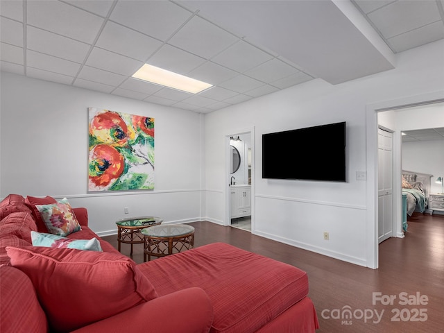 6 Lakeway Cir, Weaverville, NC 28787 - living room featuring dark wood-style flooring, a drop ceiling, and baseboards