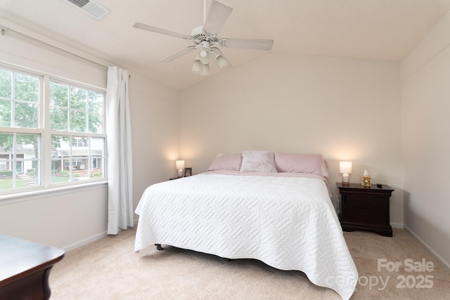 10548 English Setter Way, Charlotte, NC 28269 - bedroom with light colored carpet, baseboards, lofted ceiling, and ceiling fan