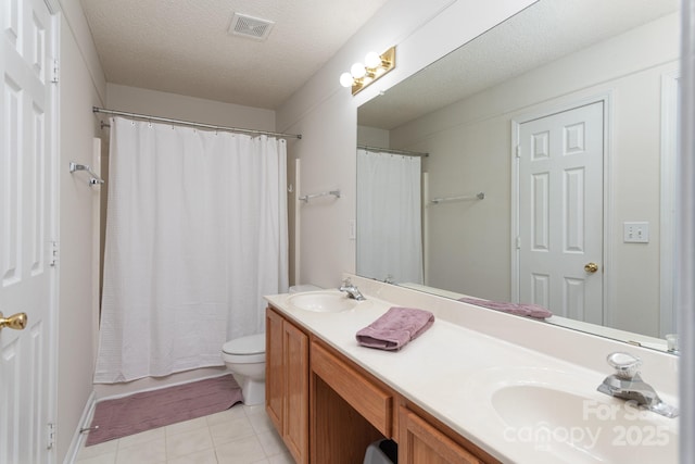 10548 English Setter Way, Charlotte, NC 28269 - full bath with double vanity, toilet, shower / tub combo with curtain, tile patterned flooring, and a textured ceiling