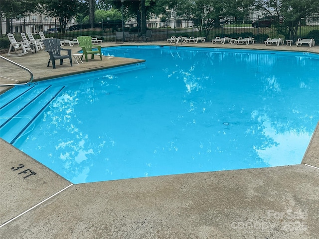 10548 English Setter Way, Charlotte, NC 28269 - community pool with a patio