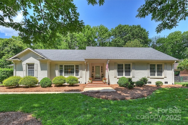 7022 Lancer Dr, Charlotte, NC 28226 - single story home featuring brick siding, a front yard, and crawl space