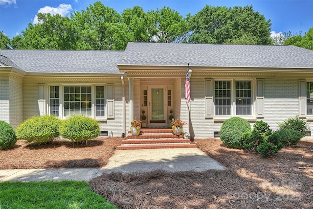 7022 Lancer Dr, Charlotte, NC 28226 - single story home with brick siding, roof with shingles, and covered porch