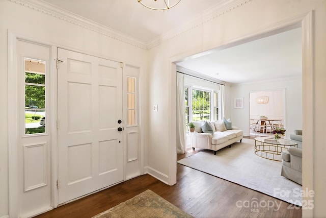 7022 Lancer Dr, Charlotte, NC 28226 - foyer with dark wood-style flooring and ornamental molding