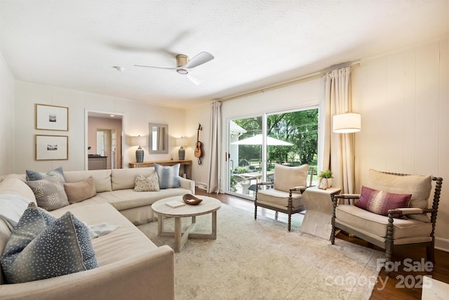 7022 Lancer Dr, Charlotte, NC 28226 - living room featuring ceiling fan and wood finished floors