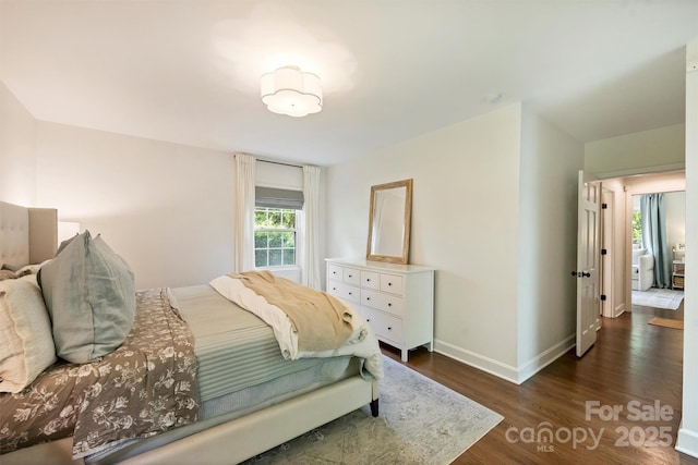 7022 Lancer Dr, Charlotte, NC 28226 - bedroom featuring dark wood-style floors and baseboards