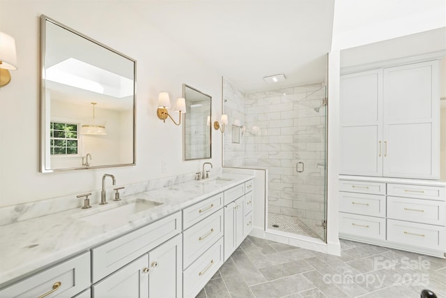 7022 Lancer Dr, Charlotte, NC 28226 - bathroom featuring double vanity and a shower stall