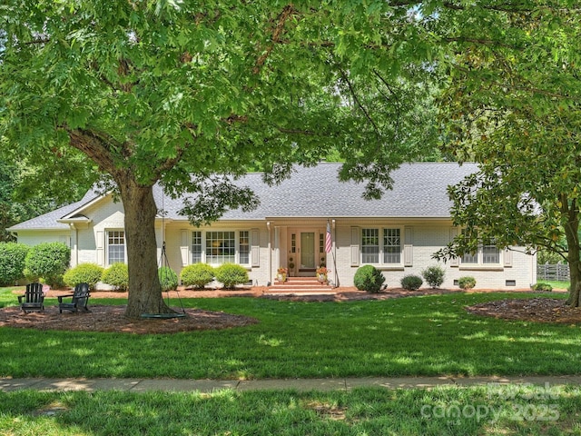 7022 Lancer Dr, Charlotte, NC 28226 - ranch-style house with brick siding, a front lawn, and a shingled roof