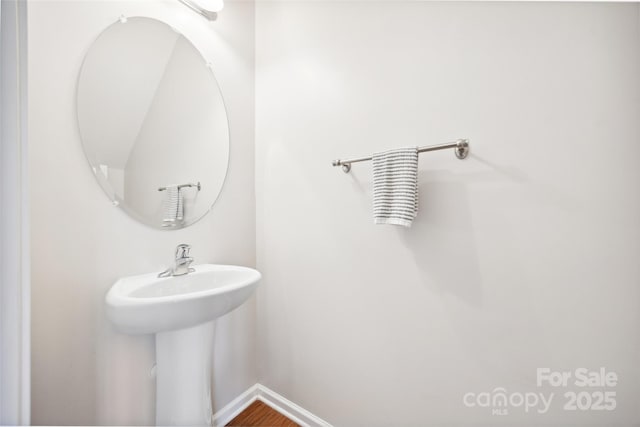 444 Battery Cir, Clover, SC 29710 - bathroom featuring baseboards and a sink