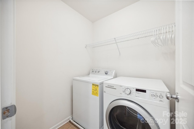444 Battery Cir, Clover, SC 29710 - washroom featuring independent washer and dryer and baseboards