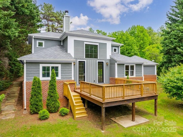 74 Eastmoor Dr, Asheville, NC 28805 - back of house with a chimney, brick siding, a wooden deck, a shingled roof, and stairs