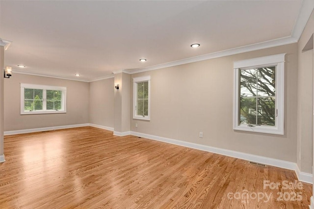 74 Eastmoor Dr, Asheville, NC 28805 - unfurnished room with crown molding, light wood finished floors, baseboards, and recessed lighting