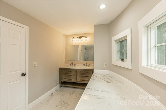 74 Eastmoor Dr, Asheville, NC 28805 - full bath with baseboards, marble finish flooring, double vanity, a marble finish shower, and recessed lighting