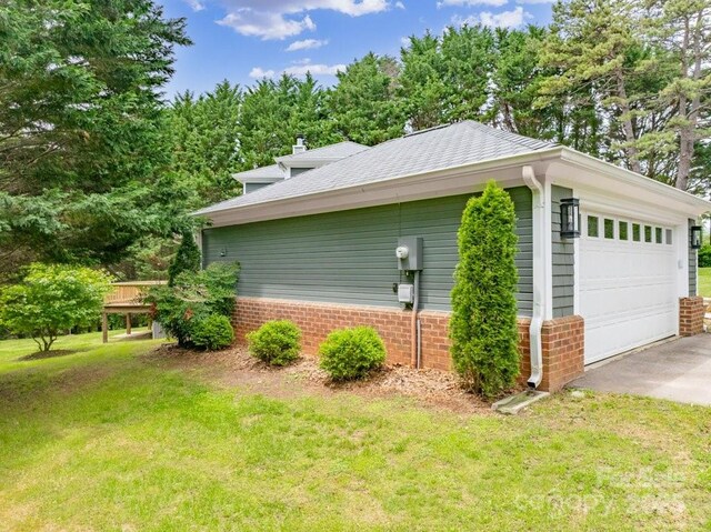 74 Eastmoor Dr, Asheville, NC 28805 - view of home's exterior featuring a lawn and brick siding