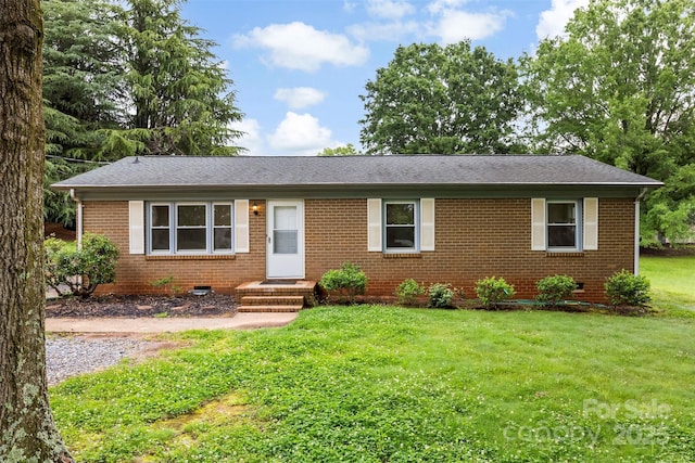 1606 Northwoods Dr, Kings Mountain, NC 28086 - ranch-style home featuring brick siding, a front yard, and roof with shingles