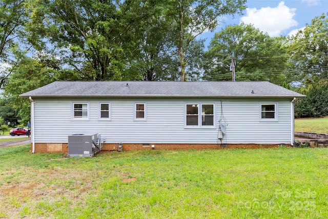 1606 Northwoods Dr, Kings Mountain, NC 28086 - rear view of property with central air condition unit, crawl space, a yard, and roof with shingles