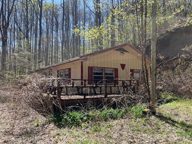 239 Laurel Dr, Whittier, NC 28789 - view of front of property with a deck and a wooded view