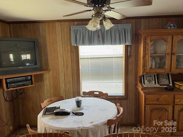 239 Laurel Dr, Whittier, NC 28789 - dining area with wood walls and ceiling fan
