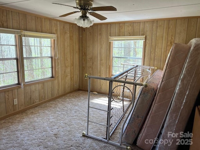 239 Laurel Dr, Whittier, NC 28789 - bedroom featuring multiple windows, wood walls, baseboards, and carpet floors