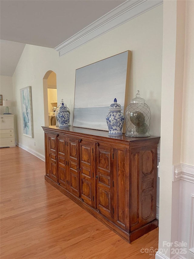 1006 Phar Lap Dr, Indian Trail, NC 28079 - detailed view of arched walkways, wood finished floors, washer / dryer, and baseboards