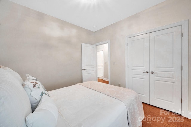 1006 Phar Lap Dr, Indian Trail, NC 28079 - bedroom featuring wood finished floors and a closet