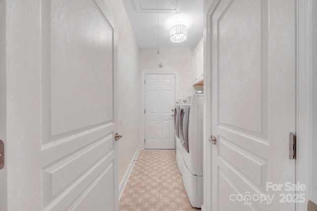 1006 Phar Lap Dr, Indian Trail, NC 28079 - laundry room with cabinet space, attic access, light floors, washer and dryer, and baseboards