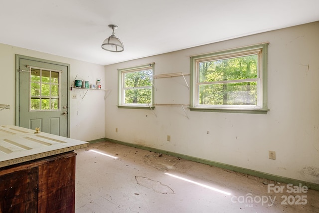 501 Deer Chase Cir, Cedar Mountain, NC 28718 - unfurnished dining area featuring baseboards