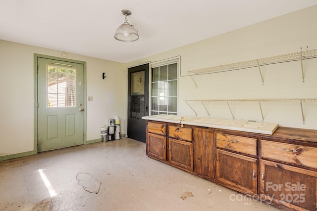 501 Deer Chase Cir, Cedar Mountain, NC 28718 - kitchen featuring brown cabinetry and concrete floors