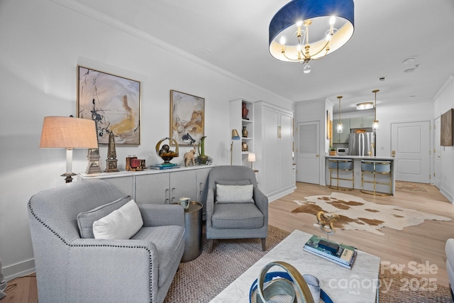 630 Calvert St Unit 111, Charlotte, NC 28208 - living room with light wood-style floors and crown molding