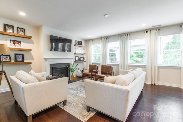 5130 Watersail Way, Clover, SC 29710 - living room featuring a glass covered fireplace, dark wood finished floors, baseboards, and recessed lighting