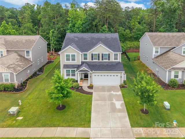 5130 Watersail Way, Clover, SC 29710 - view of front of property with driveway, an attached garage, a front lawn, and a shingled roof