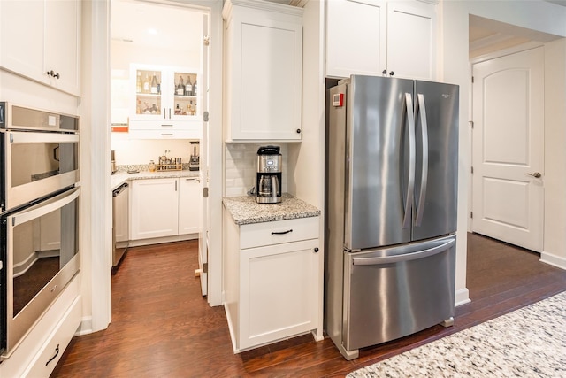 5130 Watersail Way, Clover, SC 29710 - kitchen with appliances with stainless steel finishes, dark wood-type flooring, and white cabinets