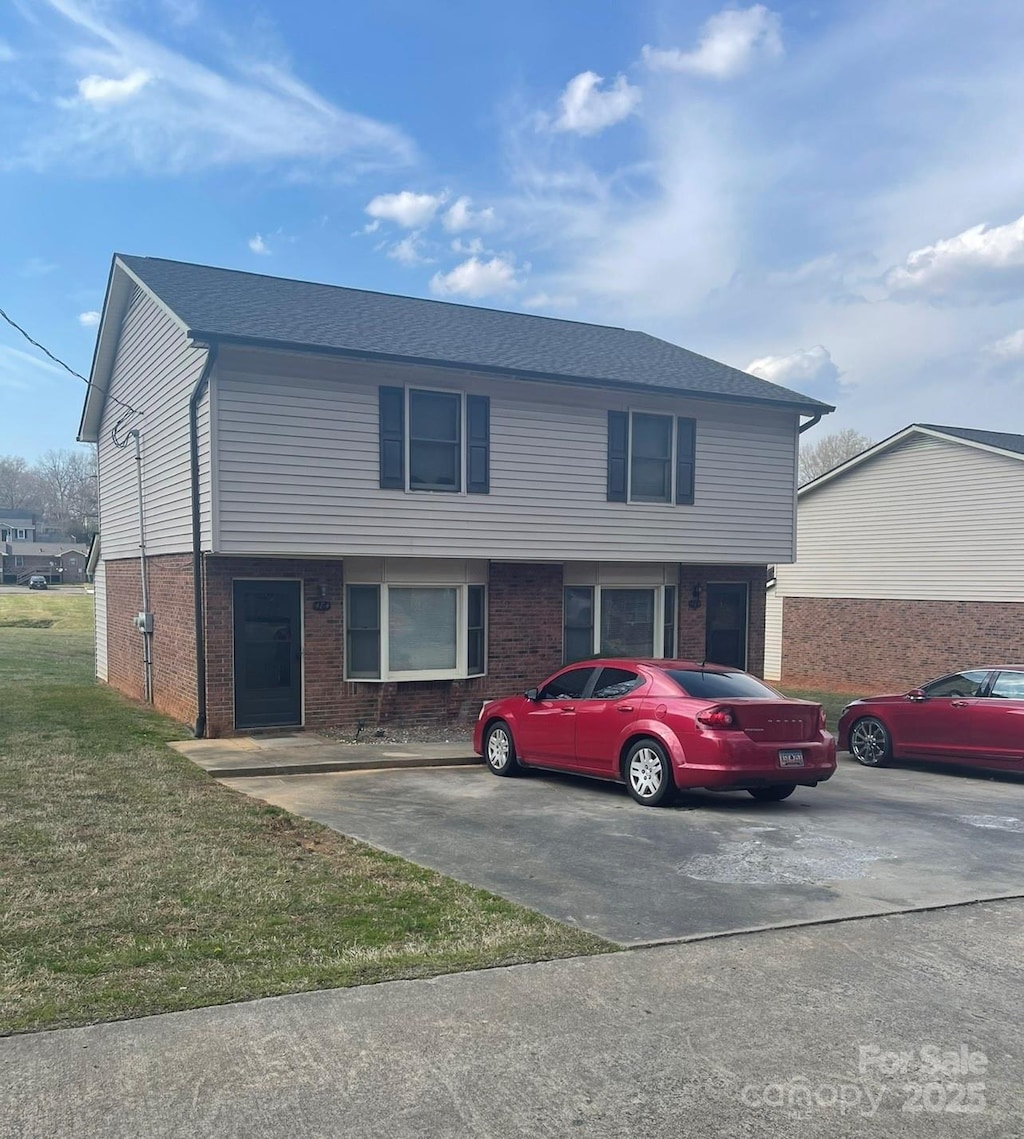 484 Willow Spring Ln Unit B, Rock Hill, SC 29730 - view of front of house featuring brick siding and a front lawn