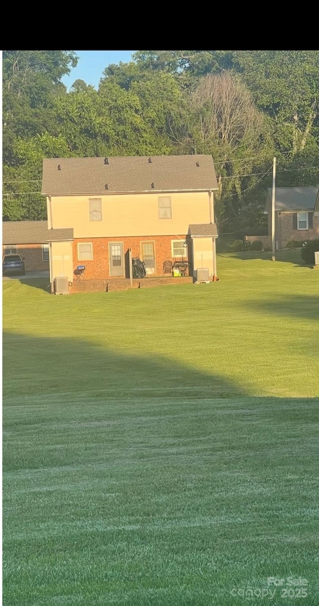 484 Willow Spring Ln Unit B, Rock Hill, SC 29730 - rear view of property with a lawn and central air condition unit