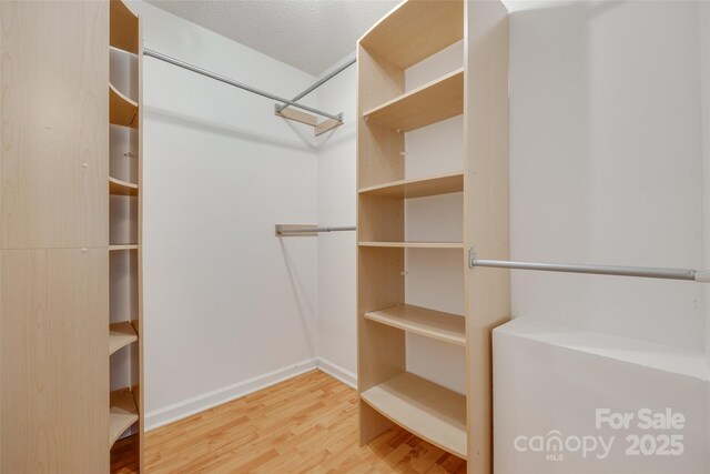 110 Eighth St, York, SC 29745 - spacious closet featuring wood finished floors