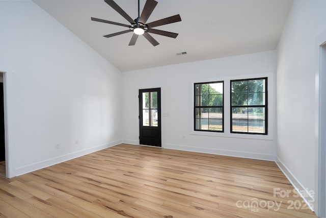 420 Sloop St, China Grove, NC 28023 - entryway with light wood-style flooring, a ceiling fan, high vaulted ceiling, and baseboards