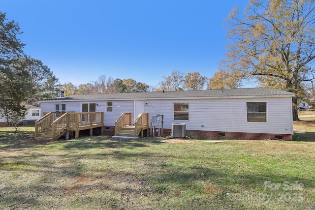 2315 Circle Dr, Great Falls, SC 29055 - back of property featuring crawl space, cooling unit, a lawn, a deck, and roof with shingles