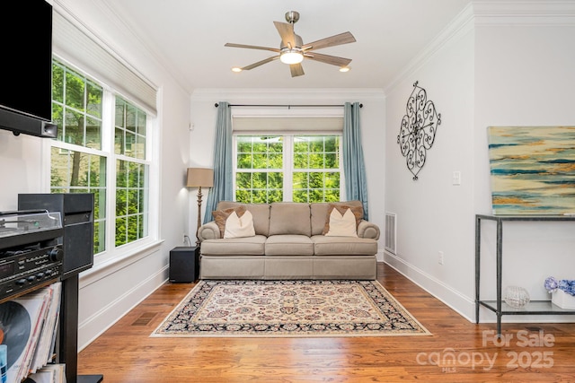 10874 Rise Ln, Fort Mill, SC 29707 - living room featuring ceiling fan, wood finished floors, crown molding, and baseboards
