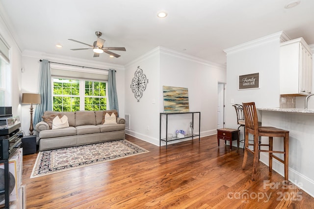 10874 Rise Ln, Fort Mill, SC 29707 - living area with ceiling fan, wood finished floors, crown molding, baseboards, and recessed lighting