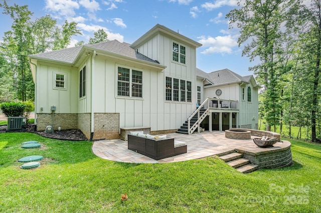 10874 Rise Ln, Fort Mill, SC 29707 - back of property featuring board and batten siding, a patio area, stairs, and a shingled roof