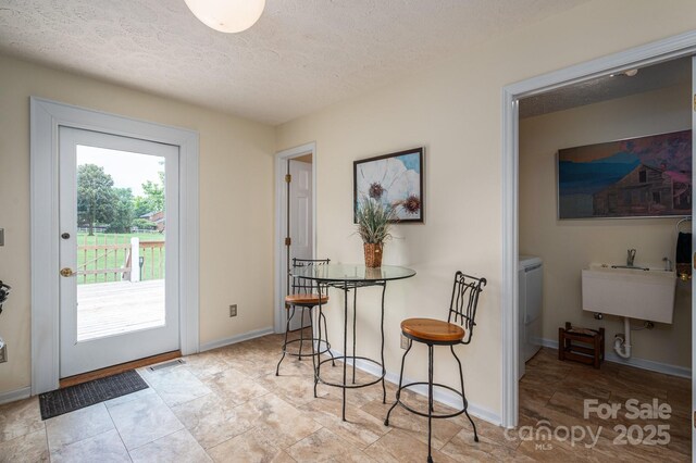 112 Ocean Dr, Shelby, NC 28152 - dining area featuring a textured ceiling