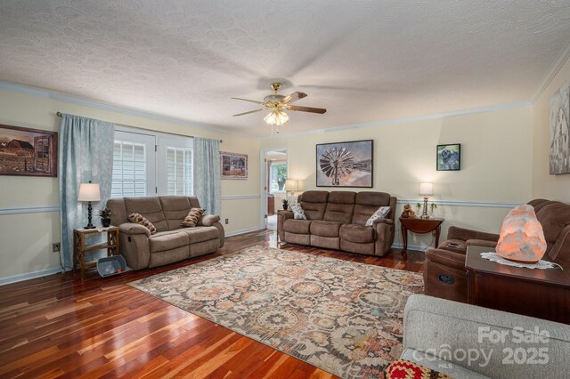 112 Ocean Dr, Shelby, NC 28152 - living area with hardwood / wood-style floors, ceiling fan, ornamental molding, a textured ceiling, and baseboards