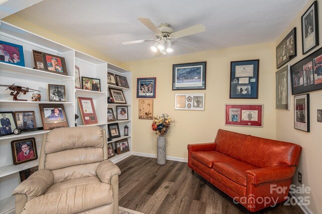112 Ocean Dr, Shelby, NC 28152 - sitting room with dark wood-type flooring, ceiling fan, and baseboards