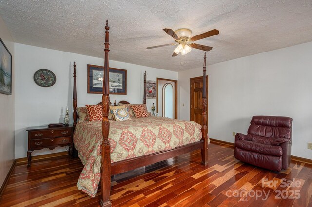 112 Ocean Dr, Shelby, NC 28152 - bedroom featuring wood finished floors, baseboards, a textured ceiling, and a ceiling fan