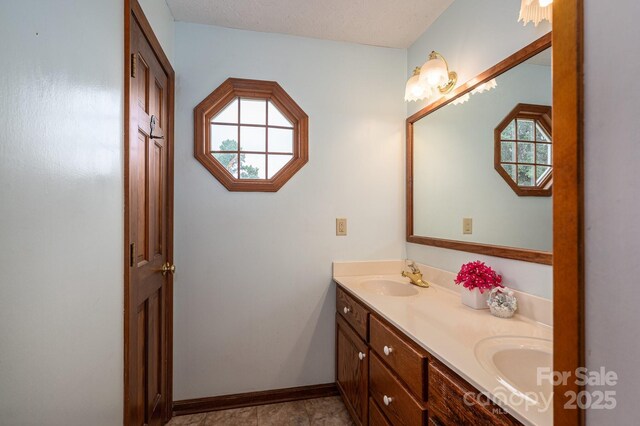 112 Ocean Dr, Shelby, NC 28152 - bathroom with double vanity and baseboards