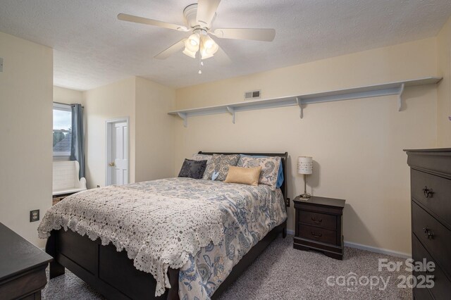 112 Ocean Dr, Shelby, NC 28152 - carpeted bedroom featuring baseboards, ceiling fan, and a textured ceiling