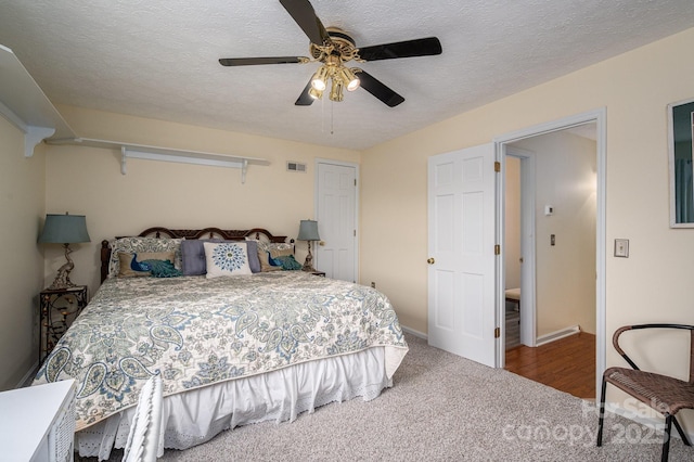 112 Ocean Dr, Shelby, NC 28152 - carpeted bedroom featuring a textured ceiling, ceiling fan, and baseboards