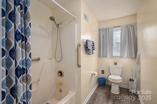 112 Ocean Dr, Shelby, NC 28152 - full bathroom featuring wood finished floors, toilet, baseboards, and shower / tub combo